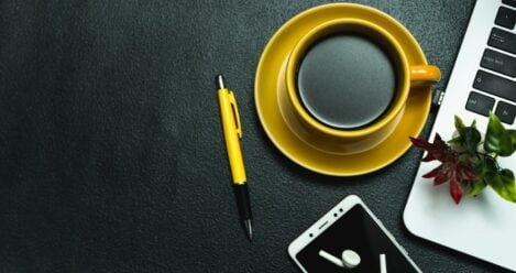 Modern software development: Coffee, laptop, and AI